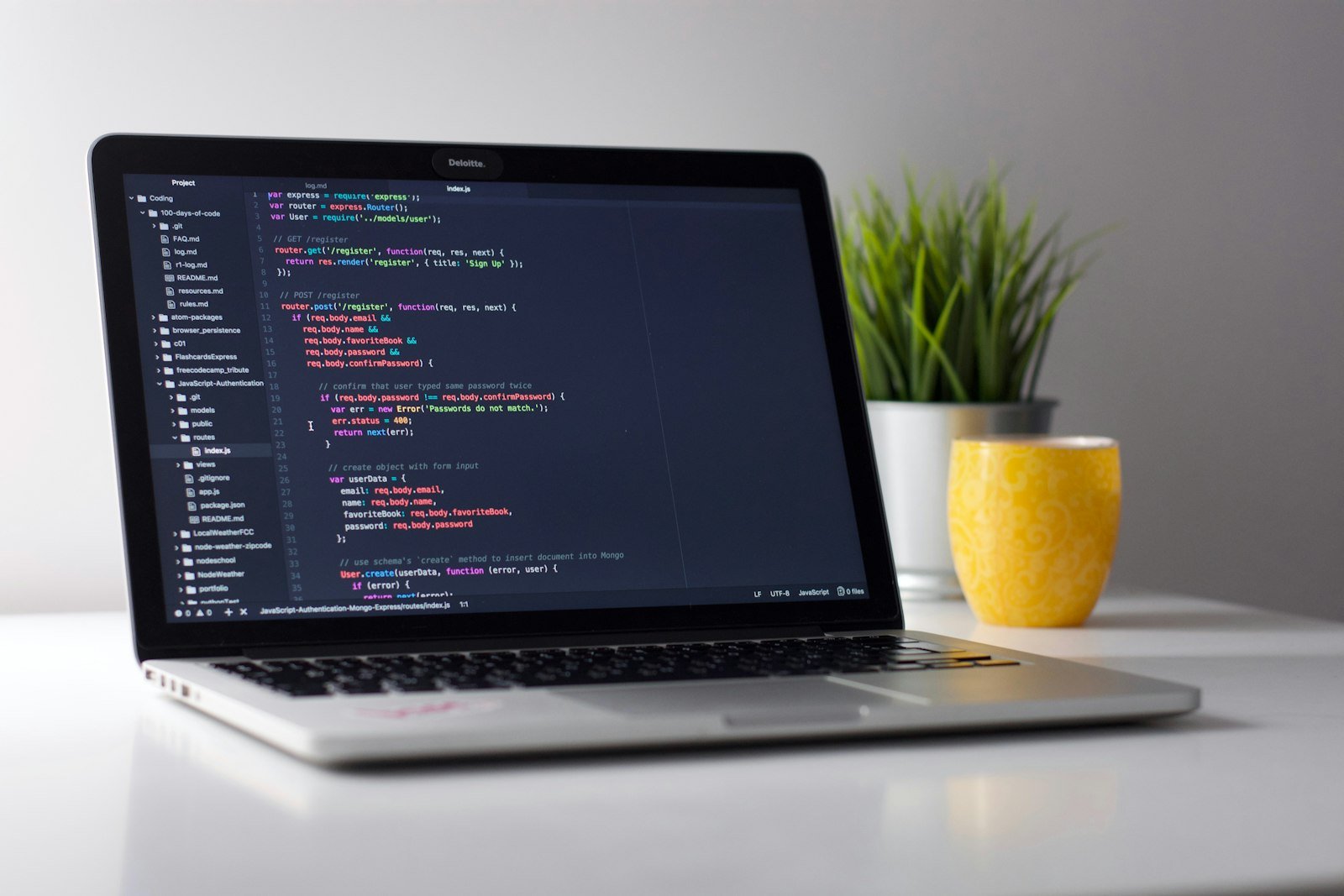 Modern software development setup with multiple monitors